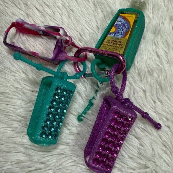 Bath & Body Works Set of 4 Silicon PocketBac Hand Gel Holders + Clip - Picture 1 of 9
